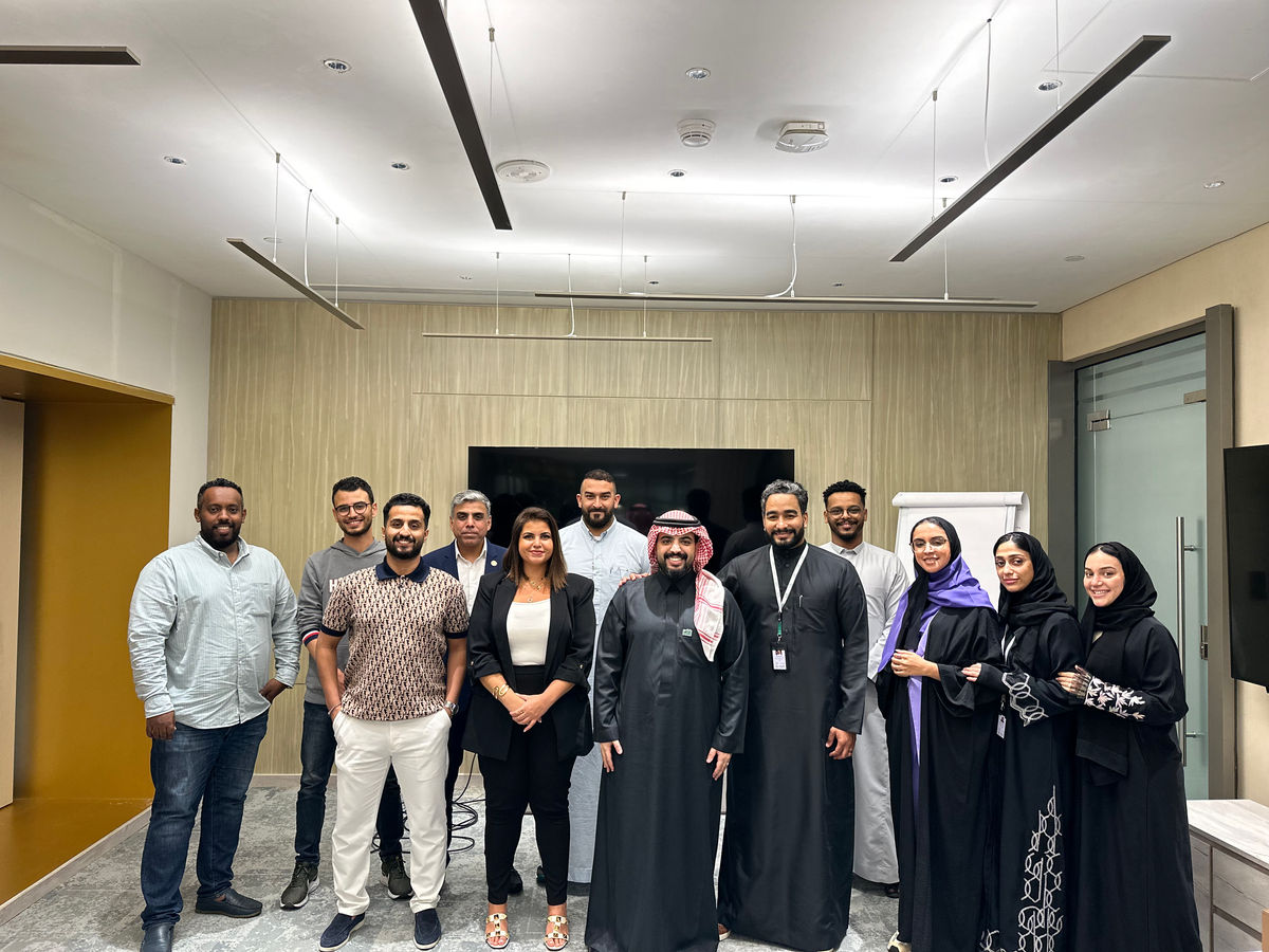 Hiba with a leadership team after a workshop